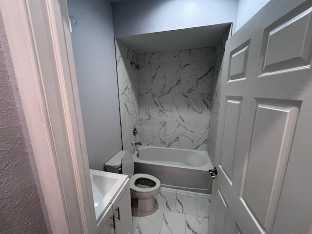 bathroom featuring a textured wall, toilet, vanity, marble finish floor, and washtub / shower combination