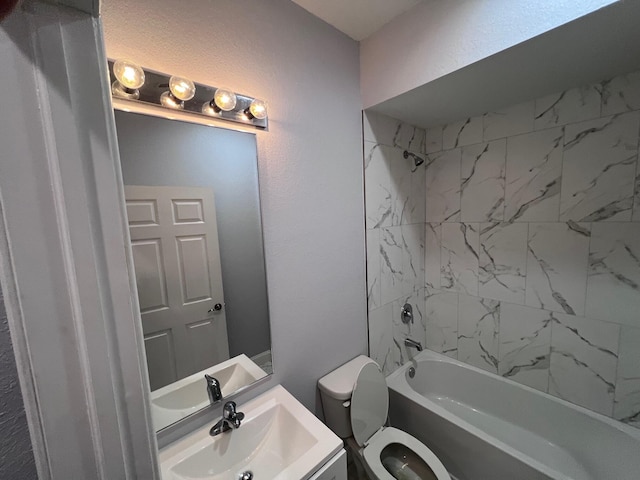 full bath featuring toilet, a textured wall, shower / tub combination, and vanity