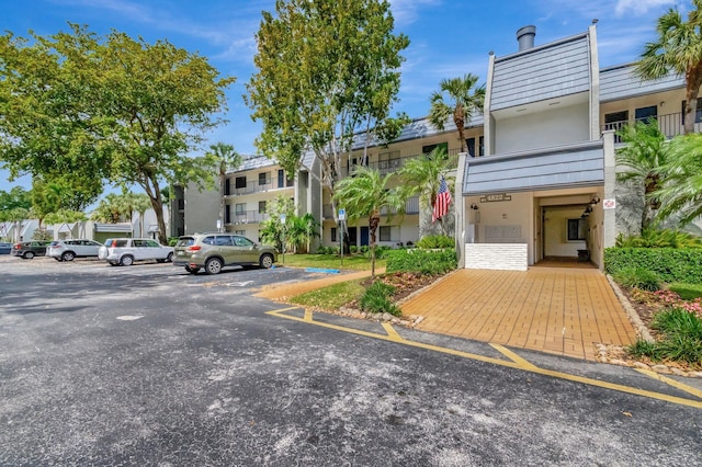 exterior space featuring uncovered parking