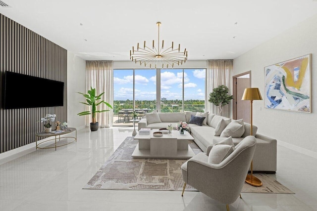 living area featuring a chandelier and baseboards