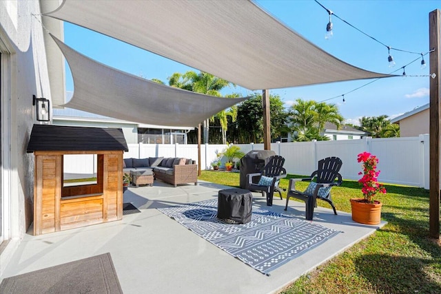 view of patio with an outdoor hangout area and a fenced backyard