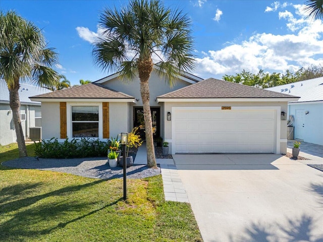 ranch-style house with a garage, a front yard, driveway, and stucco siding