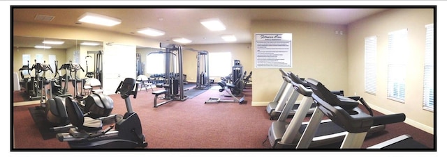 gym featuring visible vents and baseboards