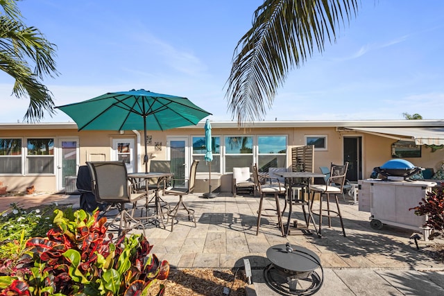 view of patio featuring outdoor dining space