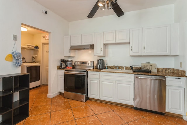 kitchen with white cabinets, appliances with stainless steel finishes, washer / clothes dryer, under cabinet range hood, and a sink