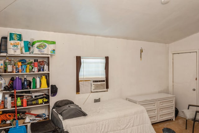 bedroom with cooling unit and vaulted ceiling