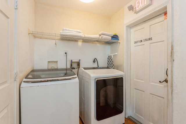 laundry room featuring laundry area and washer and dryer