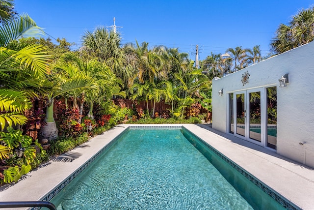 view of pool featuring a fenced in pool and fence