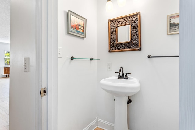 bathroom with baseboards