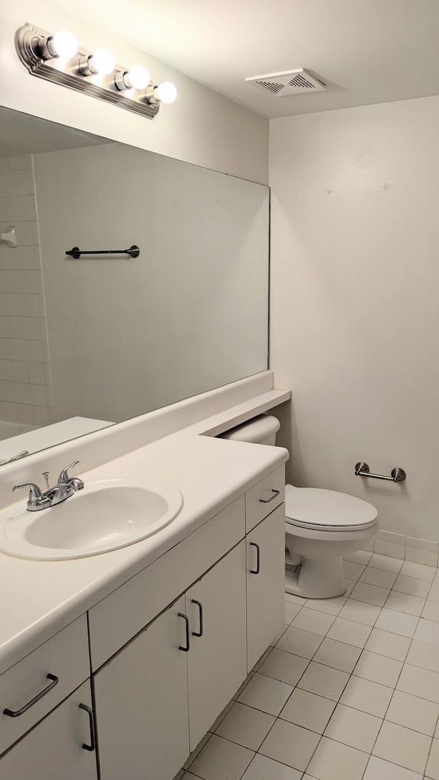 full bath featuring toilet, tile patterned flooring, visible vents, and vanity