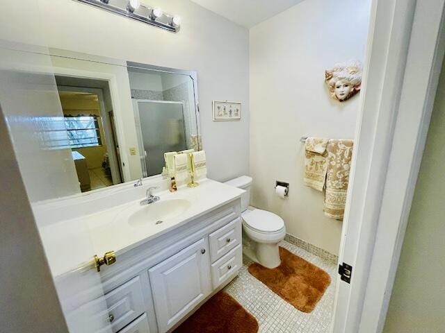 full bathroom with toilet, vanity, tile patterned flooring, and a shower stall