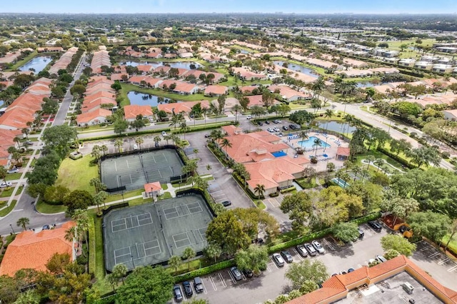 bird's eye view with a residential view and a water view