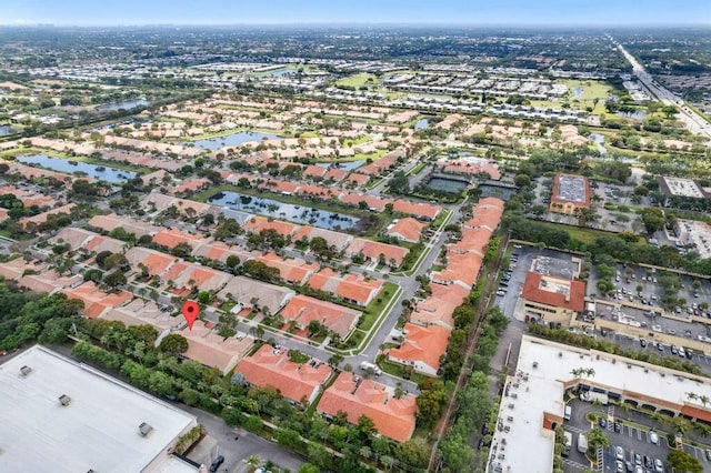 aerial view featuring a residential view and a water view