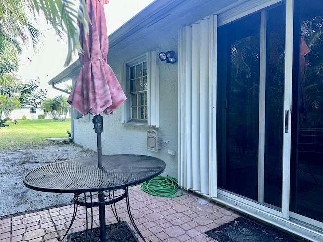 view of patio featuring outdoor dining space