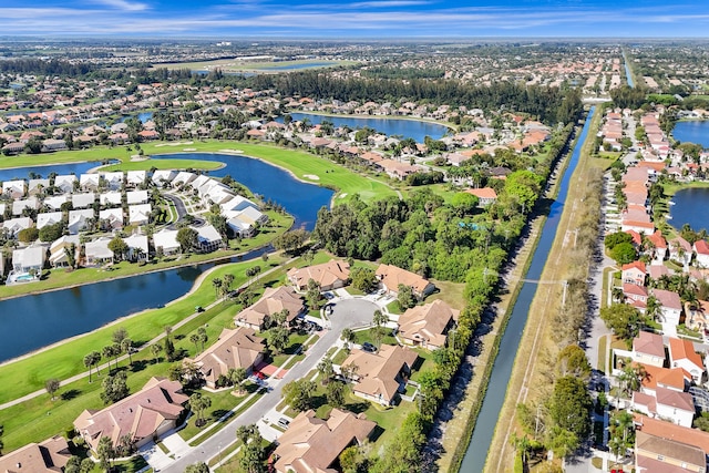 aerial view featuring a residential view and a water view