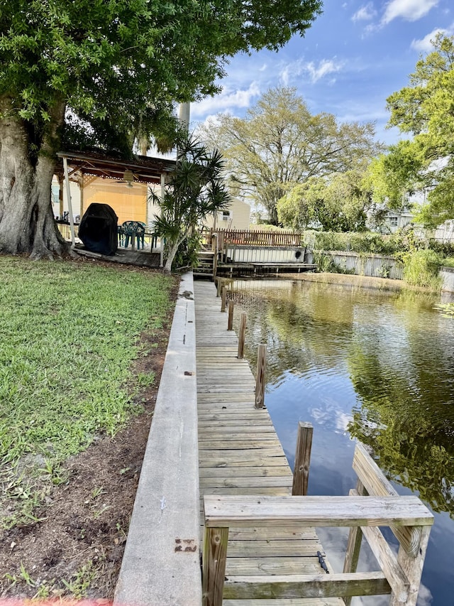 view of dock with a water view