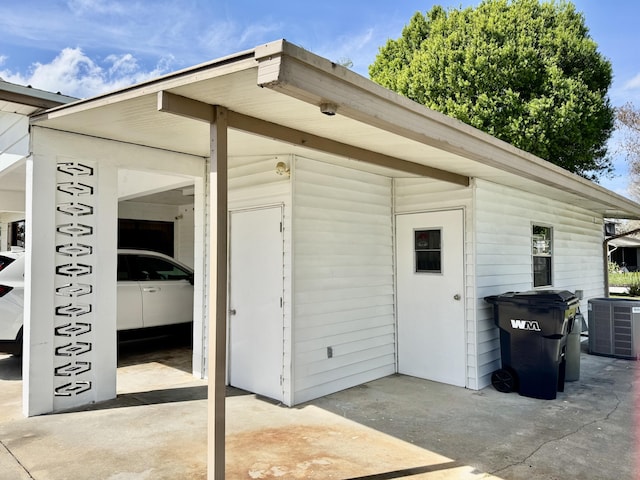 view of outbuilding featuring central air condition unit