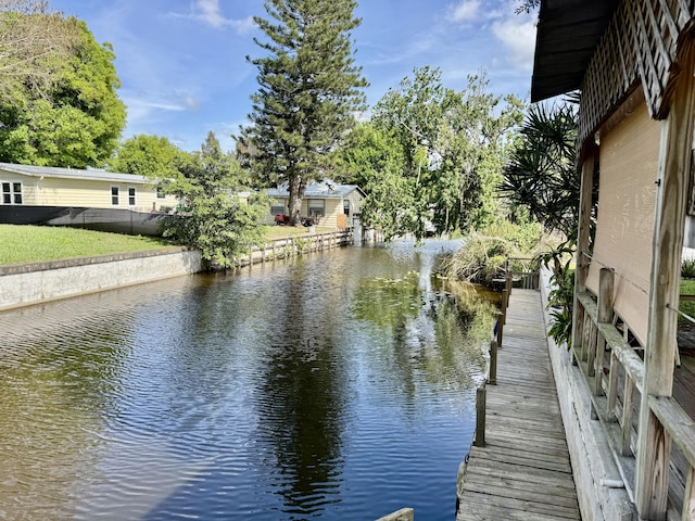 dock area featuring a water view