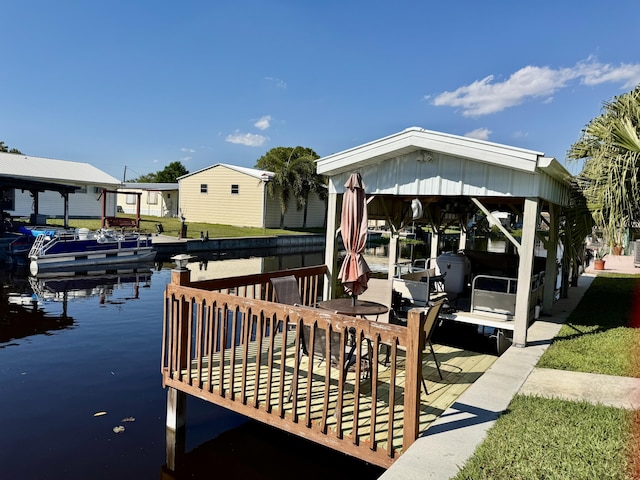 dock area featuring a water view