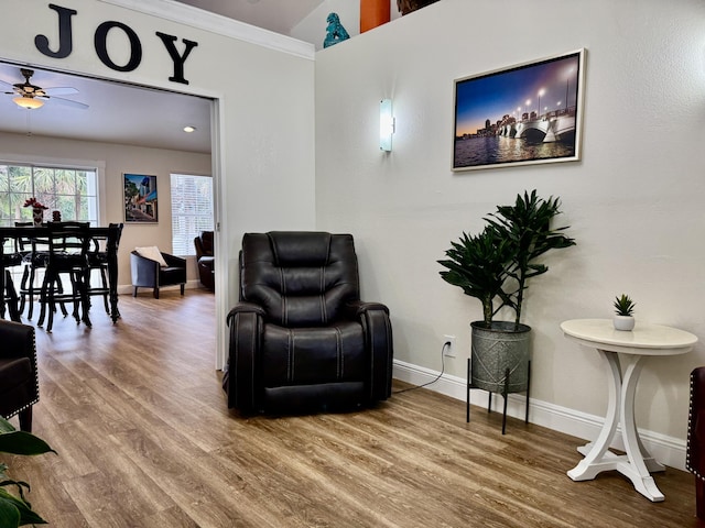 2532 NW 33rd Ave, Okeechobee, FL 34972 - living area with wood finished floors, baseboards, and a ceiling fan