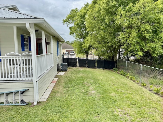 2532 NW 33rd Ave, Okeechobee, FL 34972 - view of yard featuring central AC unit and fence