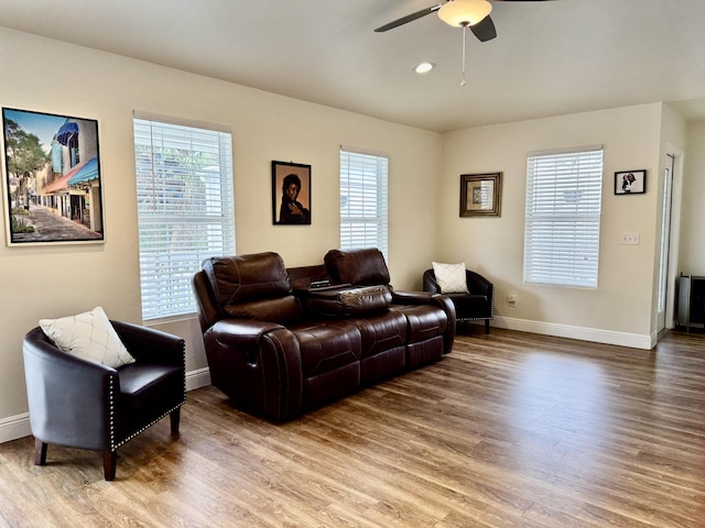 2532 NW 33rd Ave, Okeechobee, FL 34972 - living room with baseboards and wood finished floors