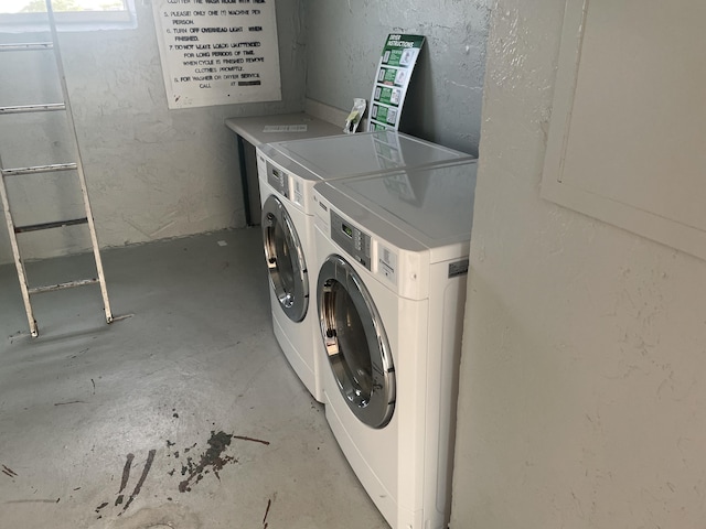 washroom with independent washer and dryer