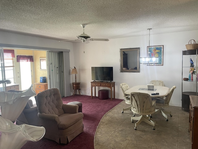 tiled living room with ceiling fan and a textured ceiling