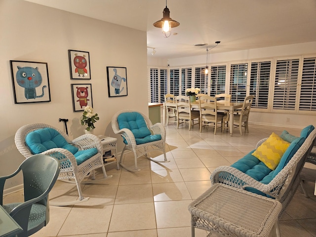 living room with light tile patterned flooring