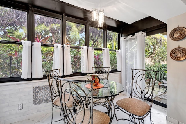 sunroom / solarium with a healthy amount of sunlight