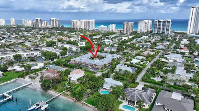 aerial view featuring a water view and a city view