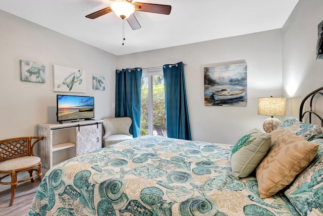 bedroom featuring ceiling fan and wood finished floors