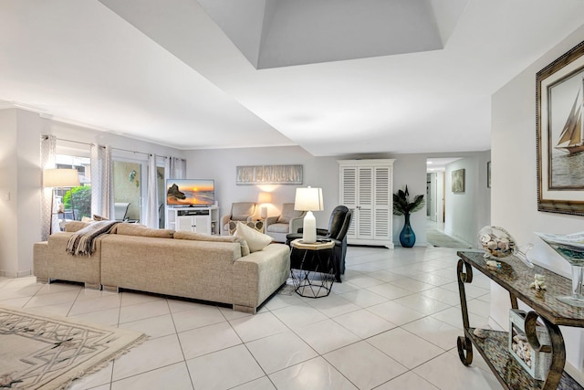 living area with light tile patterned floors