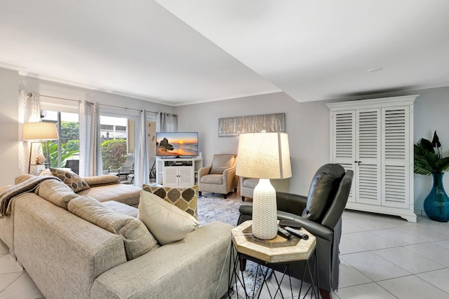 living room featuring light tile patterned floors and ornamental molding