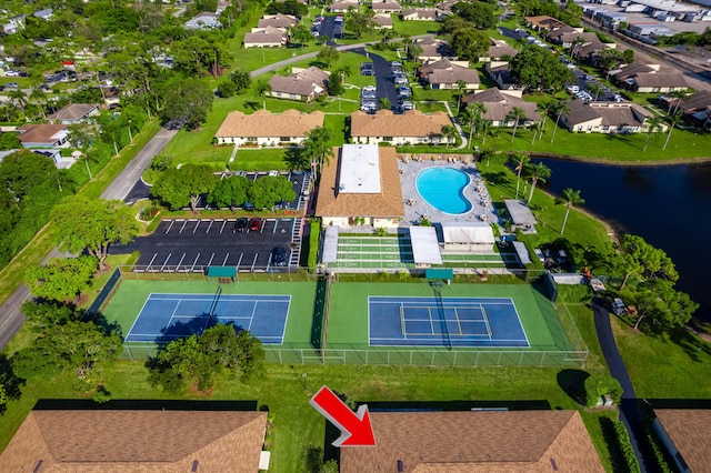 aerial view with a water view and a residential view