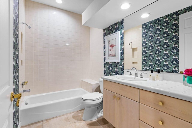 full bathroom with tile patterned flooring, toilet, recessed lighting, vanity, and shower / bathing tub combination