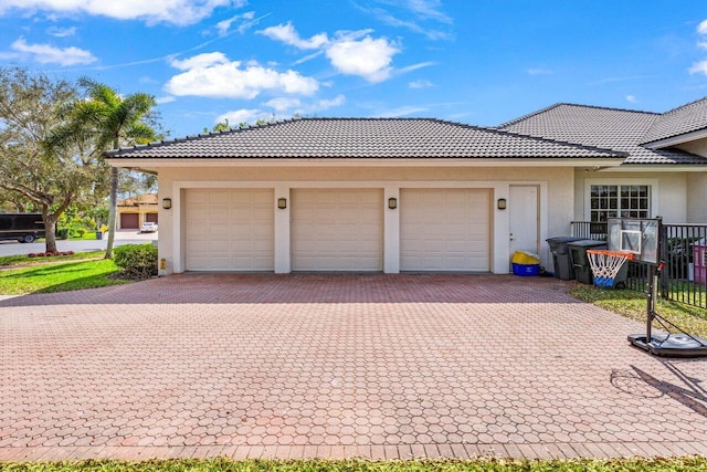 exterior space with decorative driveway