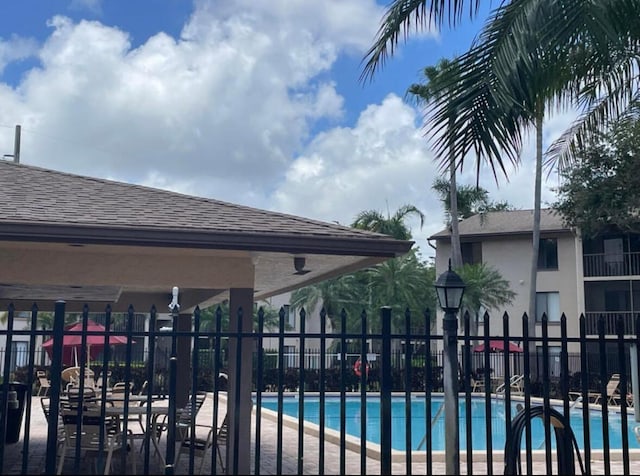 pool featuring fence