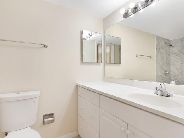 full bath featuring a shower, toilet, and vanity