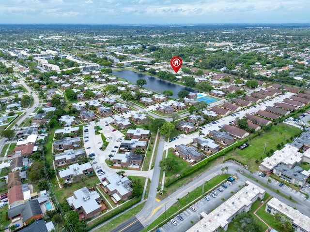 aerial view featuring a residential view and a water view