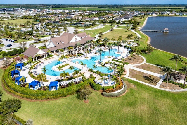 aerial view with a water view and a residential view