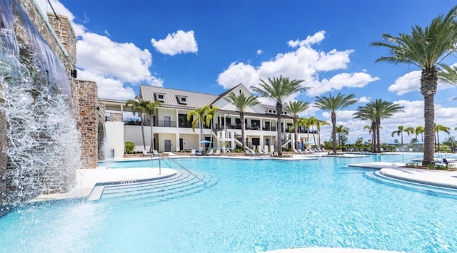 community pool with a patio area