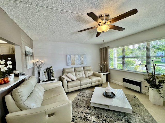 172 Tilford I, Deerfield Beach, FL 33442 - living room featuring light tile patterned floors, a textured ceiling, and ceiling fan