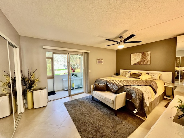 172 Tilford I, Deerfield Beach, FL 33442 - bedroom featuring light tile patterned floors, a textured ceiling, ceiling fan, and access to outside