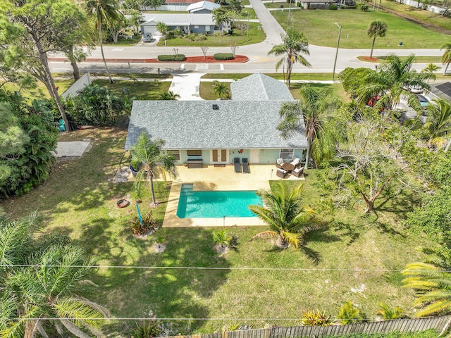 view of swimming pool featuring a patio area and a fenced backyard