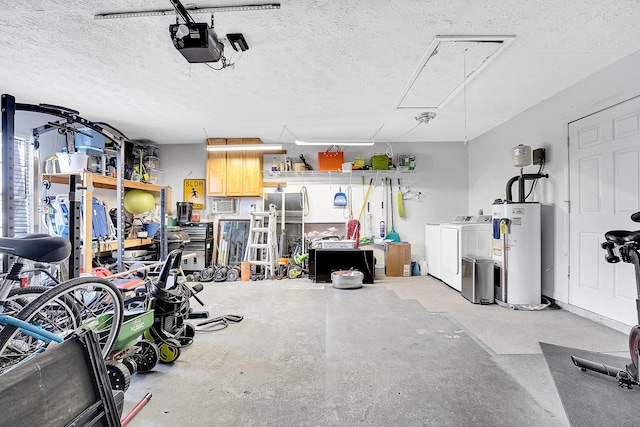 garage with water heater, separate washer and dryer, and a garage door opener