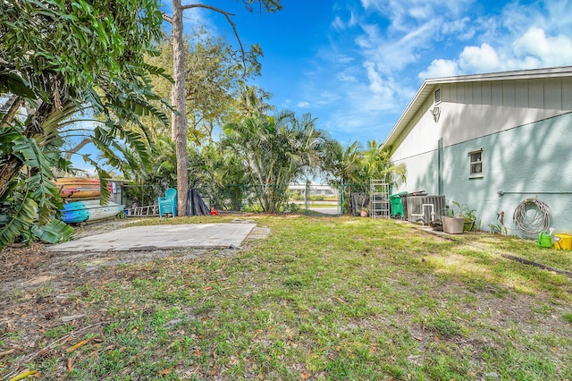 view of yard with a fenced backyard and a patio