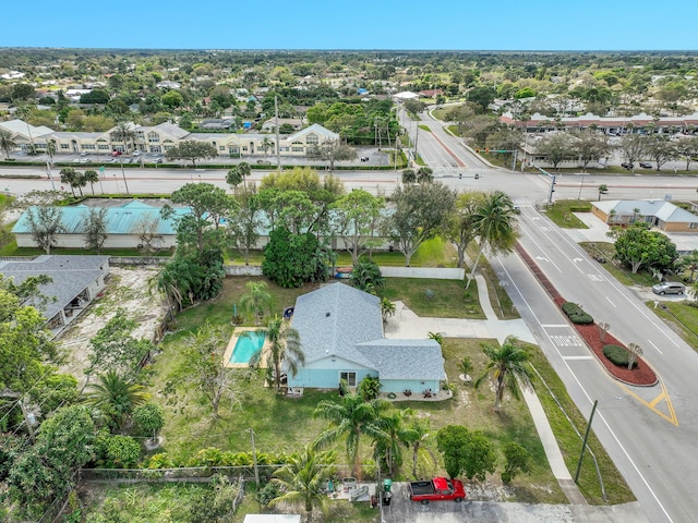 birds eye view of property with a residential view