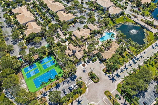 aerial view featuring a water view and a residential view