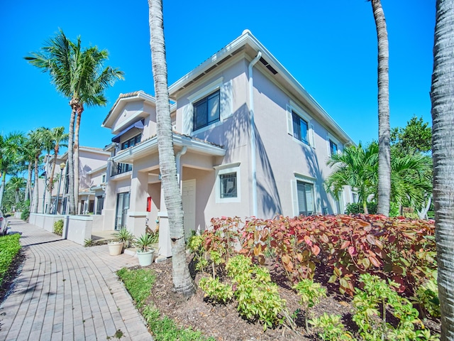 view of home's exterior with stucco siding